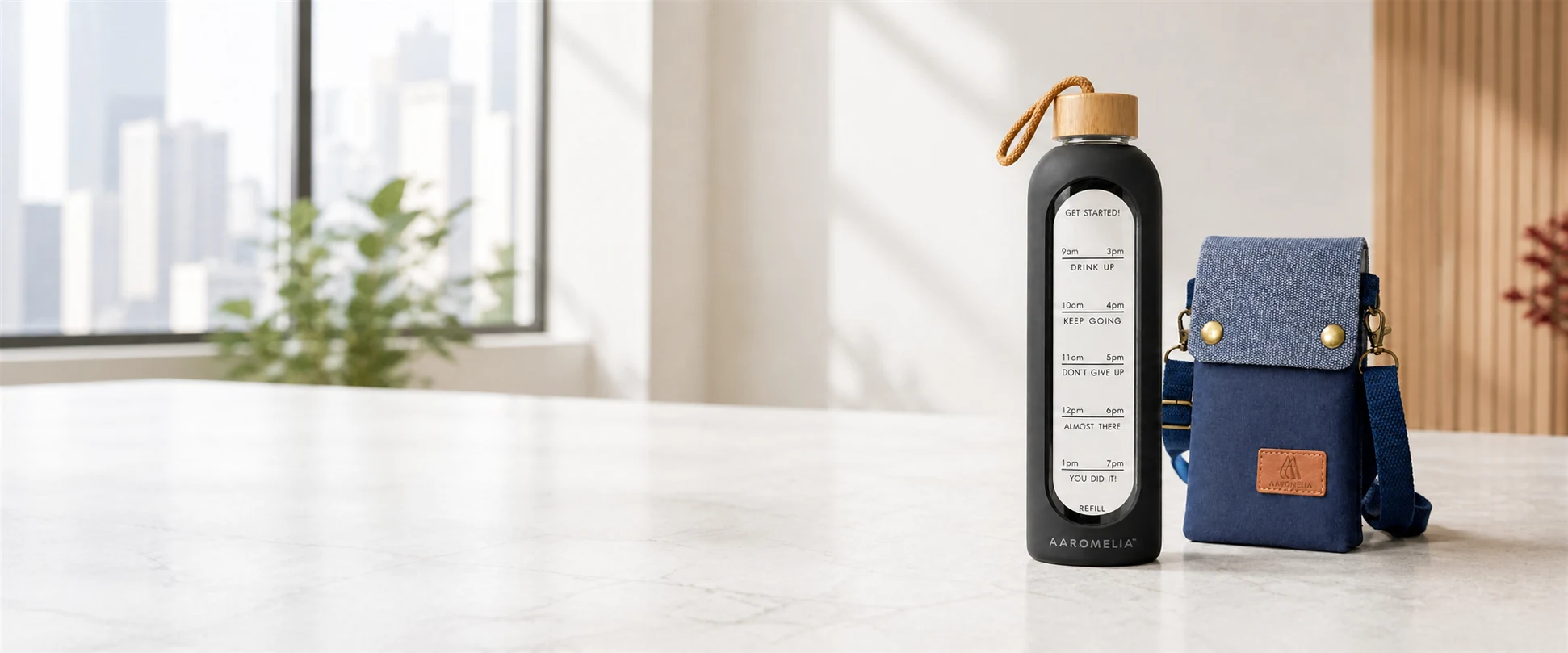 Aaromelia black glass bottle and navy sling bag